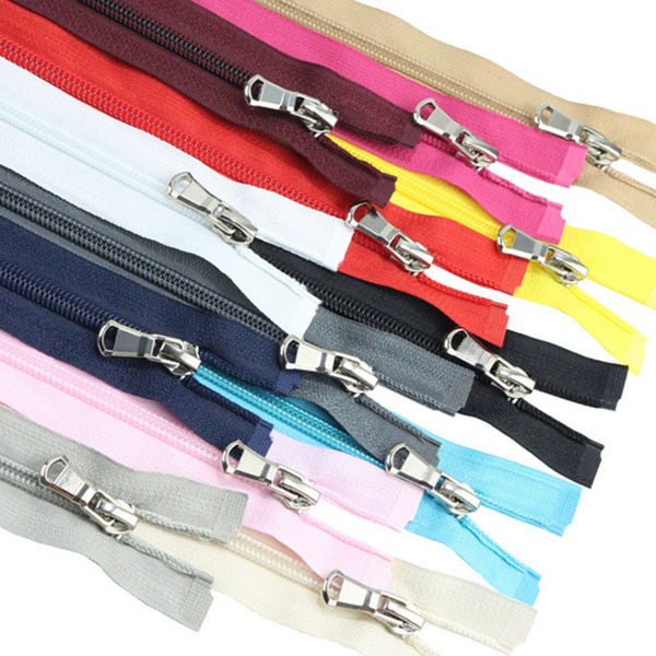 Our standard invisible zippers are available in multiple sizes (6", 12”, 14”, 16”, 18”, 20” and 22") and are available in common colors including black and white. This allows you to easily find what you need to complete your project.Our zippers are available in multiple sizes .
